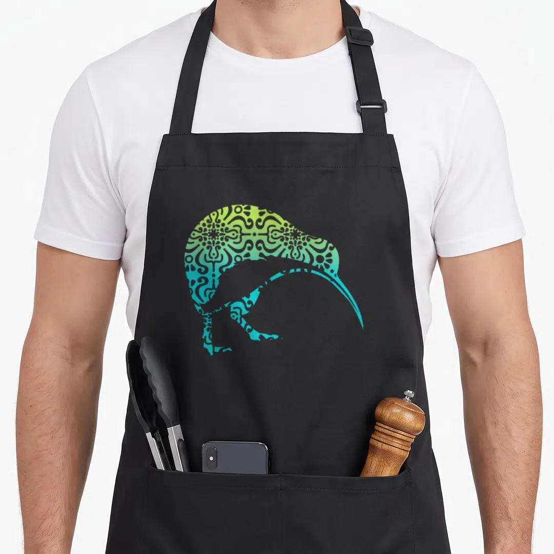 Maori kiwi new zealand apron - Bird silhouette filled with green blue yellow gradient and mandala pattern — shown on a black cotton canvas apron against a white background