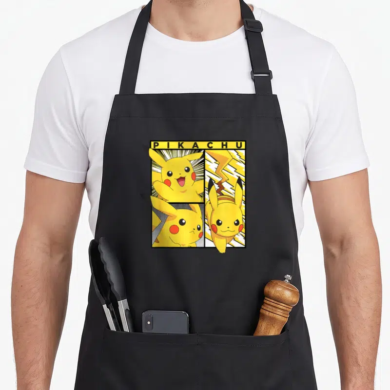 Funny trend apron - Pikachu comic panels yellow bar lightning bolt cartoon style — shown on a black cotton canvas apron against a white background
