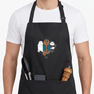 Jacket bear apron - Three cartoon bears, brown wearing blue jacket and sunglasses, white and black flanking sides — shown on a black cotton canvas apron against a white background