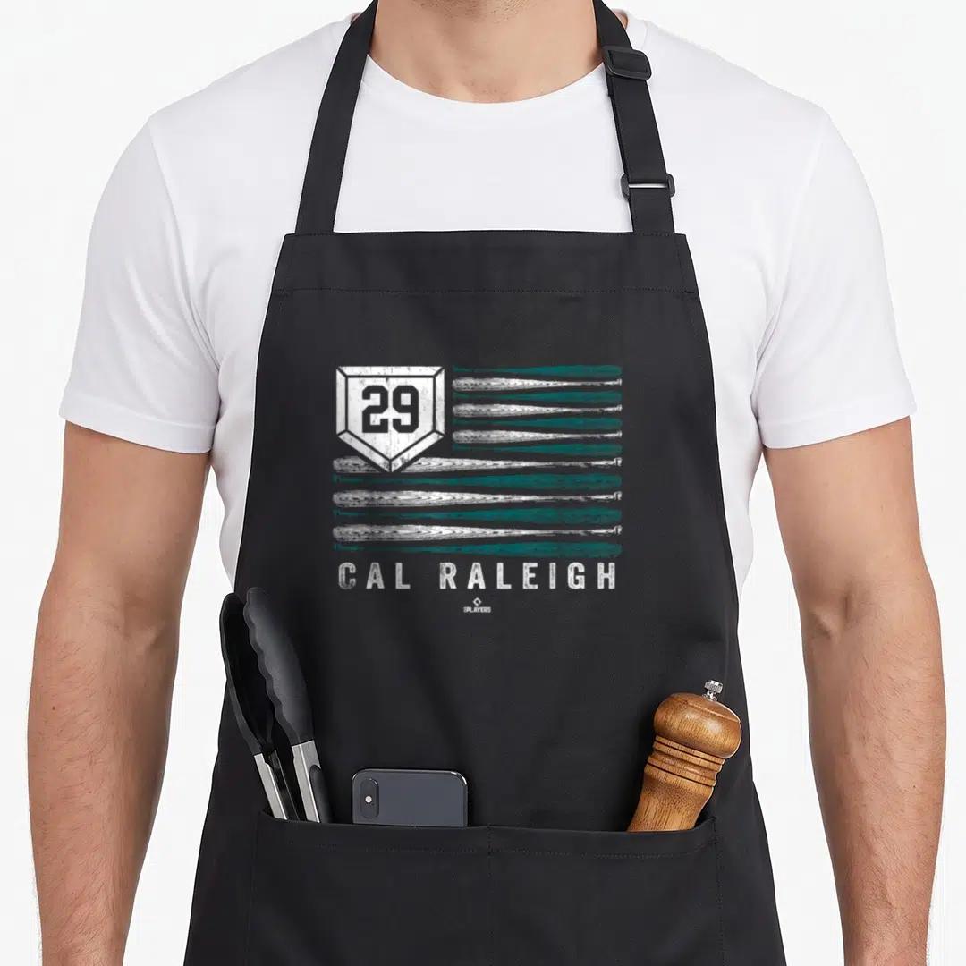 Flag stripe apron - Teal and white distressed baseball bat flag stripes with number 29 shield and Cal Raleigh text — shown on a black cotton canvas apron against a white background