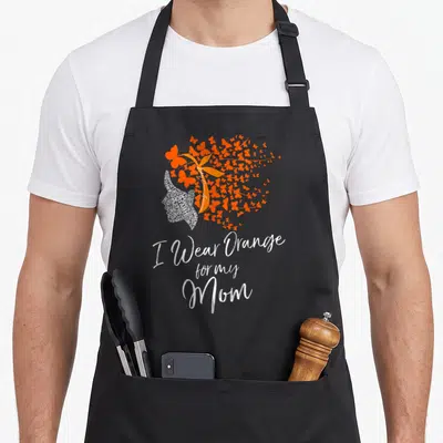 Cute cancer kidney disease awareness apron - Orange butterflies and ribbon with white text cloud and script reading I — shown on a black cotton canvas apron against a white background