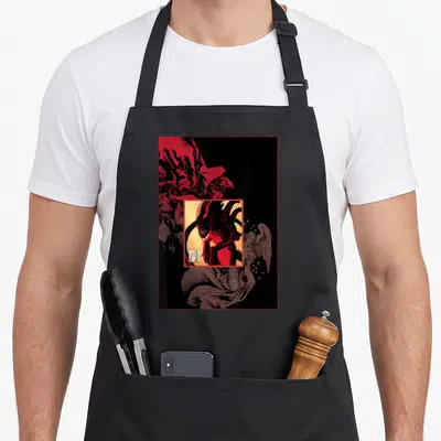 Alien gothic apron - Xenomorph in gold frame surrounded by red and black demons and angel line art — shown on a black cotton canvas apron against a white background