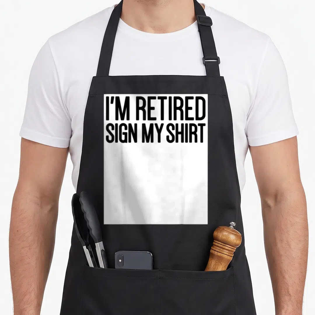 Sign funny retirement aprons - Black text I'm Retired Sign My Shirt stacked on white background — shown on a black cotton canvas apron against a white background