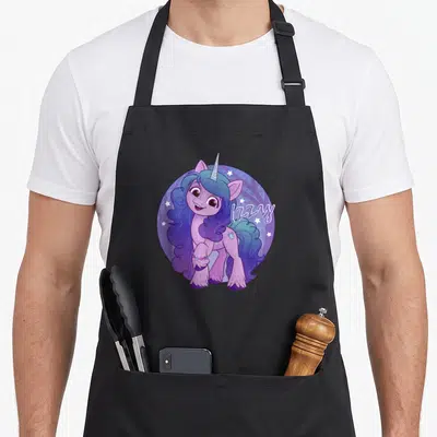 Izzy unicorn apron - Cartoon pony in purple circle with stars and trees, text Izzy to the right — shown on a black cotton canvas apron against a white background