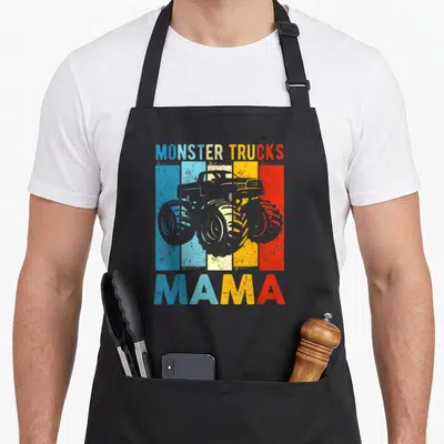 Monster mama truck apron - Grey monster truck silhouette over five vertical stripes of blue, light blue, yellow — shown on a black cotton canvas apron against a white background