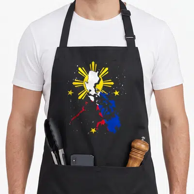Heritage pride apron - Map of Philippines filled with blue red white and yellow flag colors surrounded by a yellow sun — shown on a black cotton canvas apron against a white background
