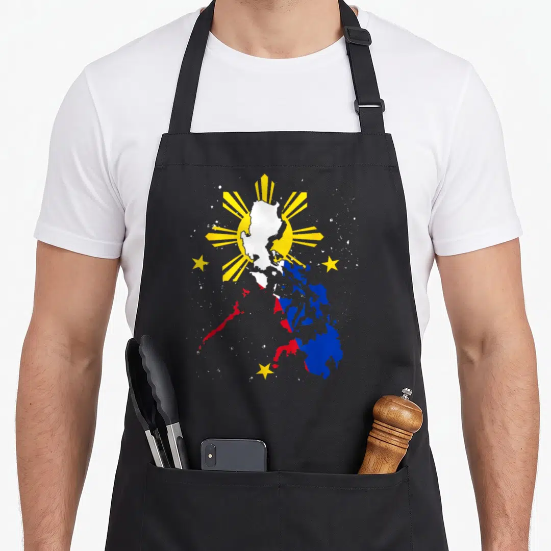Heritage pride apron - Map of Philippines filled with blue red white and yellow flag colors surrounded by a yellow sun — shown on a black cotton canvas apron against a white background