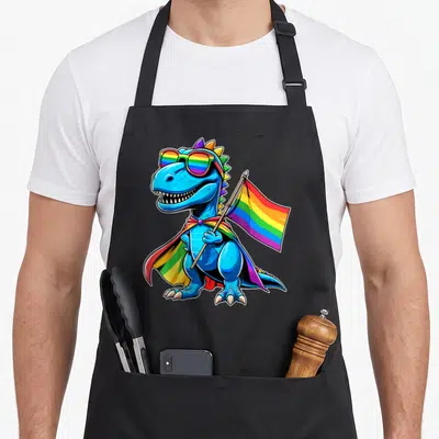 Gay dinosaur apron - Blue cartoon dinosaur wearing rainbow sunglasses and cape holding a rainbow flag on a pole — shown on a black cotton canvas apron against a white background