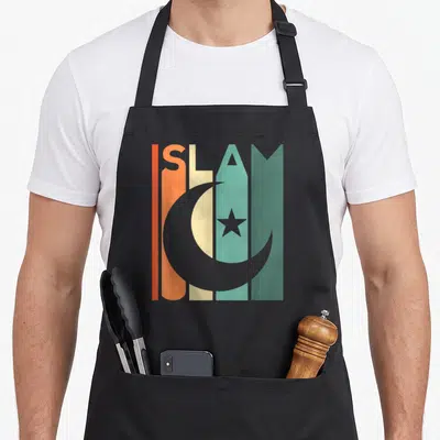 Islam arab apron - ISLAM text in orange teal grey cream stripes with grey crescent moon and star overlay — shown on a black cotton canvas apron against a white background