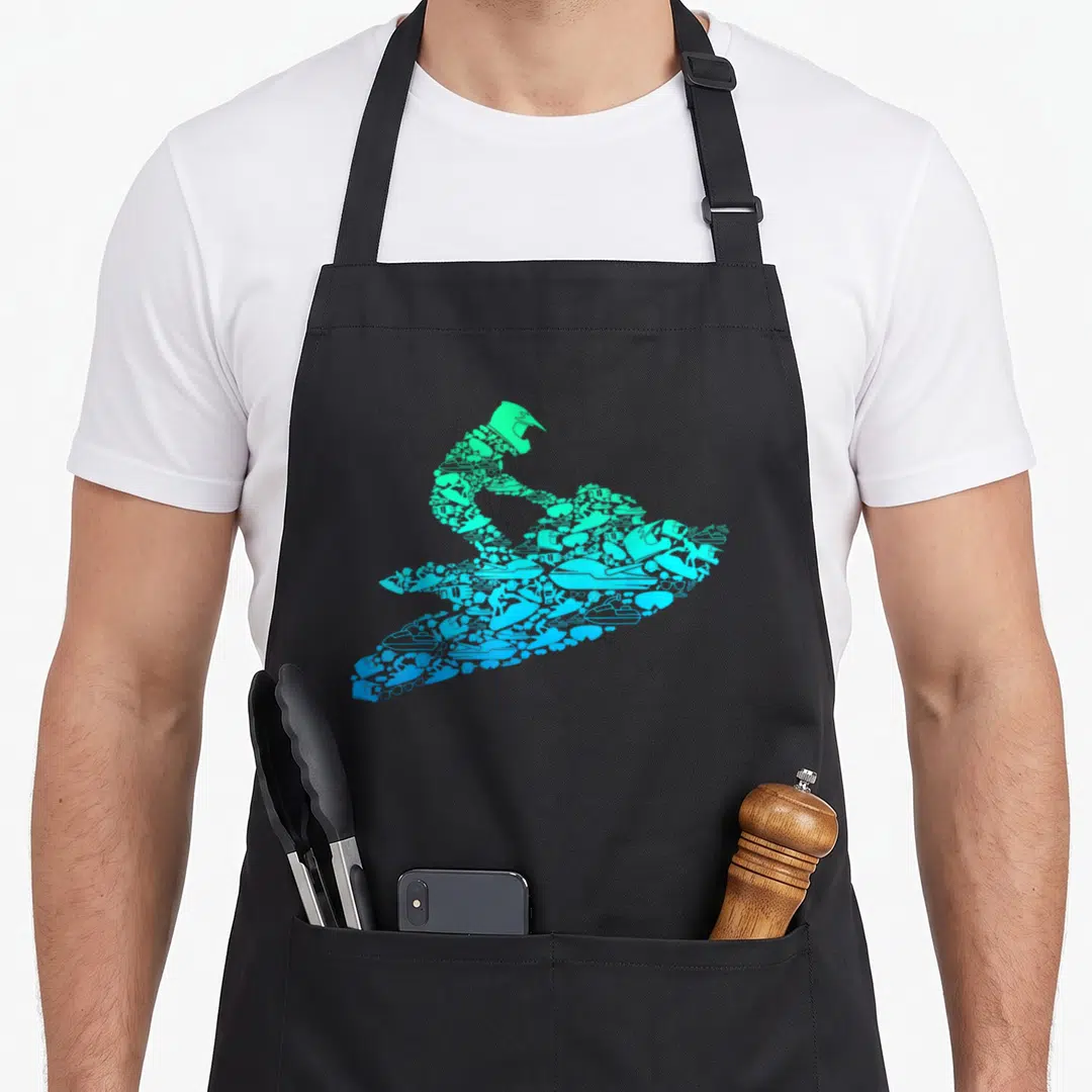 Ski jet girl apron - Composite silhouette of a jet ski rider made of smaller icons in green, blue, and cyan gradients — shown on a black cotton canvas apron against a white background
