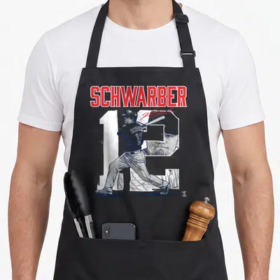 Kyle baseball fan apron - Red SCHWARBER text over white number 12 with batting player and face portrait in distressed — shown on a black cotton canvas apron against a white background