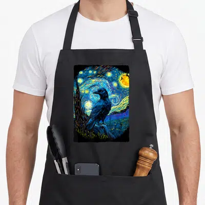 Crow van gogh apron - Retro raven perched on branch against swirling blue yellow starry night sky and village — shown on a black cotton canvas apron against a white background
