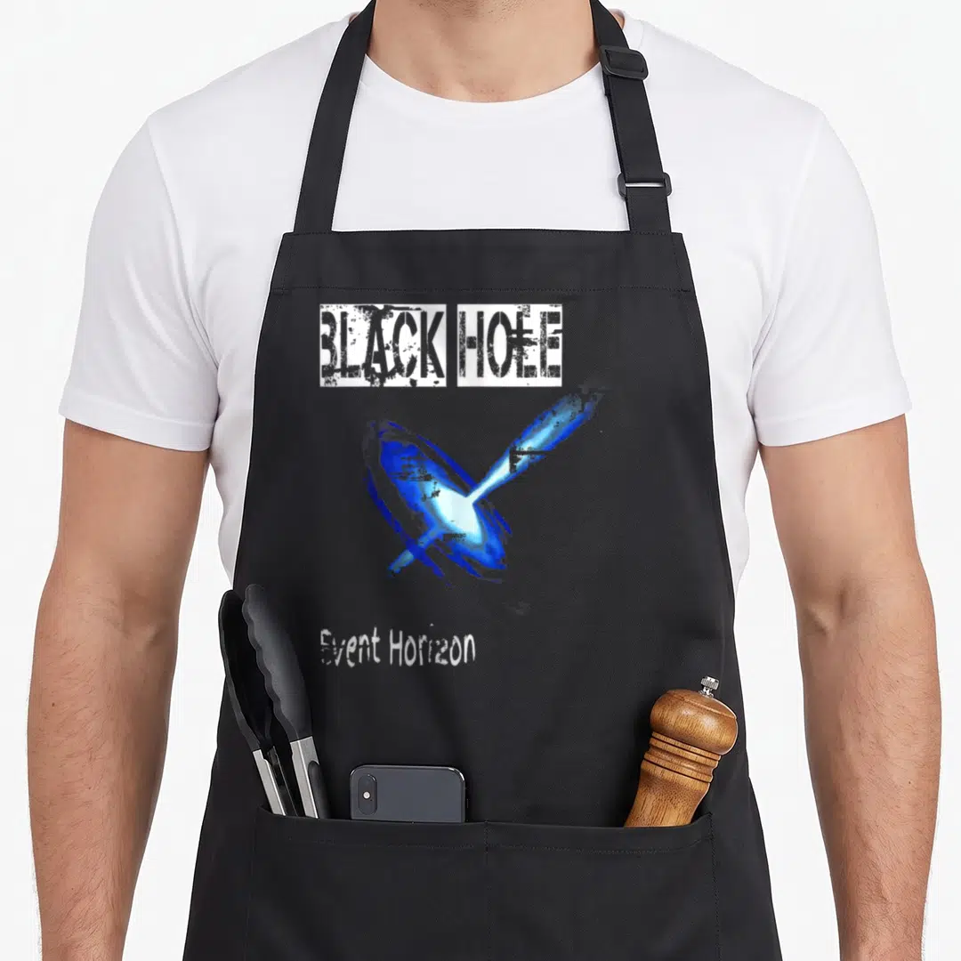 Event black hole apron - Blue black hole with jet and white text reading BLACK HOLE and Event Horizon — shown on a black cotton canvas apron against a white background