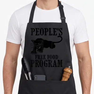 Free food aprons - Black panther centered between People's Free Food Program text in bold font — shown on a black cotton canvas apron against a white background
