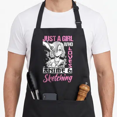 Otaku sketching anime apron - Anime girl illustration with pencil and pink text JUST A GIRL WHO LOVES ANIME & Sketching — shown on a black cotton canvas apron against a white background
