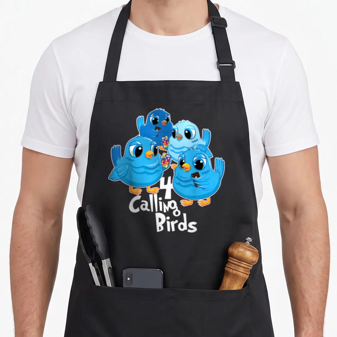 Four christmas apron - Four blue cartoon birds holding smartphones with 4 Calling Birds text below — shown on a black cotton canvas apron against a white background