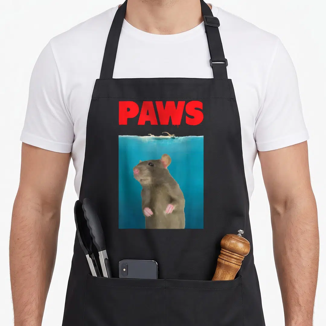 Paw rat lover apron - Red PAWS text above a brown rat swimming underwater in blue water — shown on a black cotton canvas apron against a white background