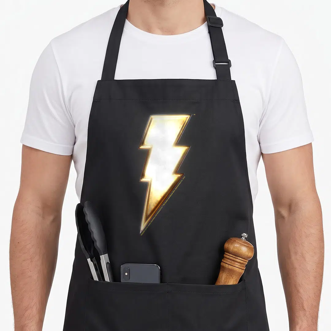 Funny lightning bolt apron - Realistic white and gold lightning bolt centered on black fabric — shown on a black cotton canvas apron against a white background