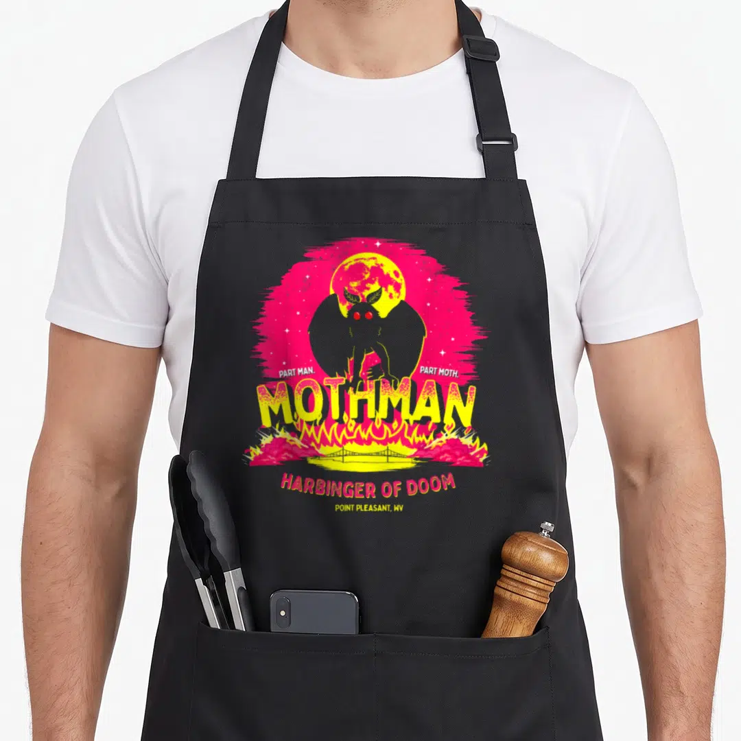 Mothman moth collecting apron - Grey Mothman silhouette with Part Man Part Moth text over moon and fire scene — shown on a black cotton canvas apron against a white background