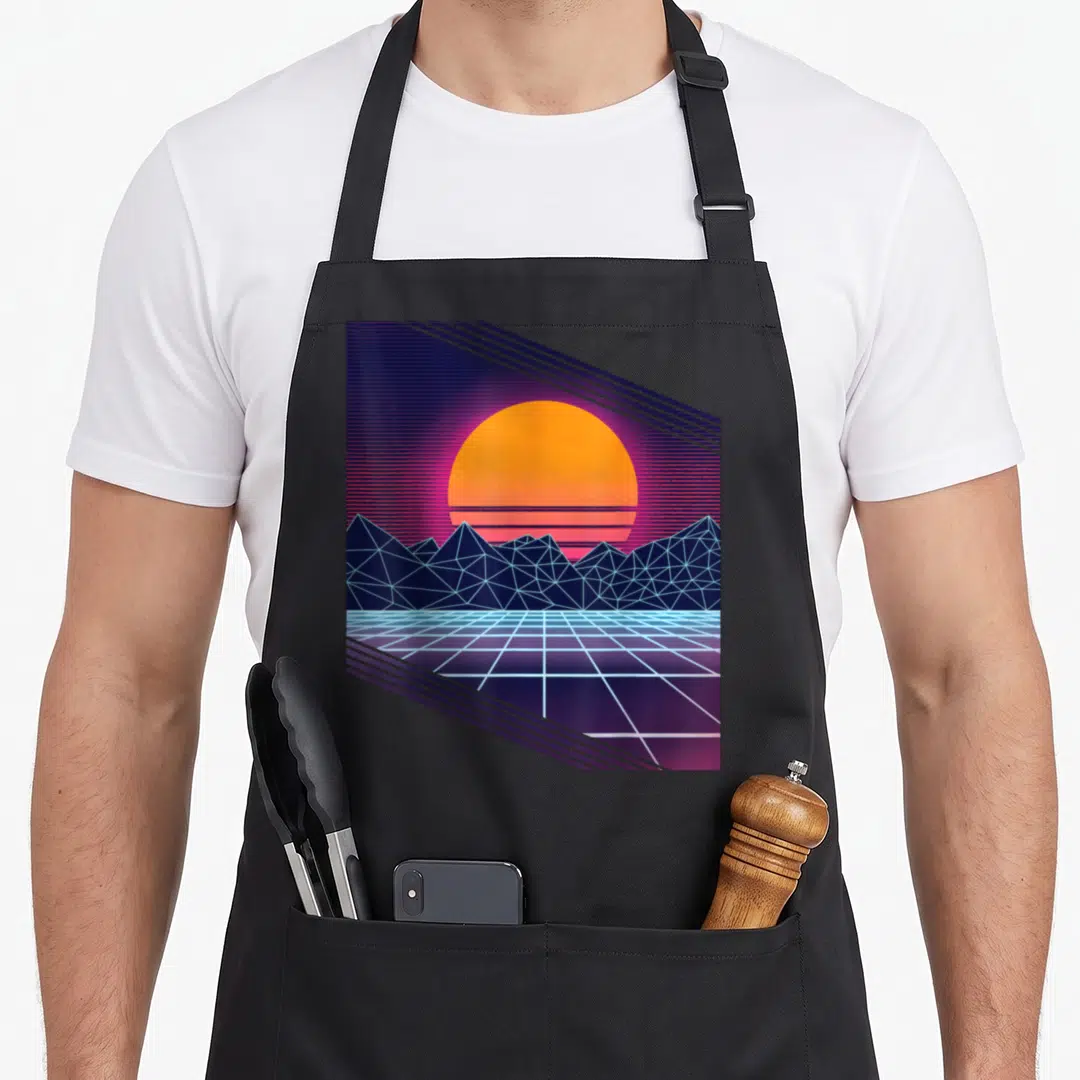 Vaporwave 80s apron - Orange sun over blue wireframe mountains and perspective grid with diagonal lines — shown on a black cotton canvas apron against a white background
