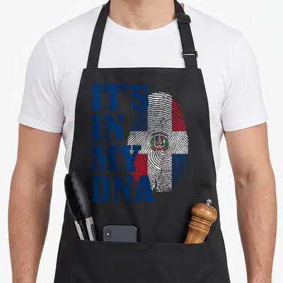Republic dna pride apron - Distressed blue text IT'S IN MY DNA next to flag colored fingerprint — shown on a black cotton canvas apron against a white background