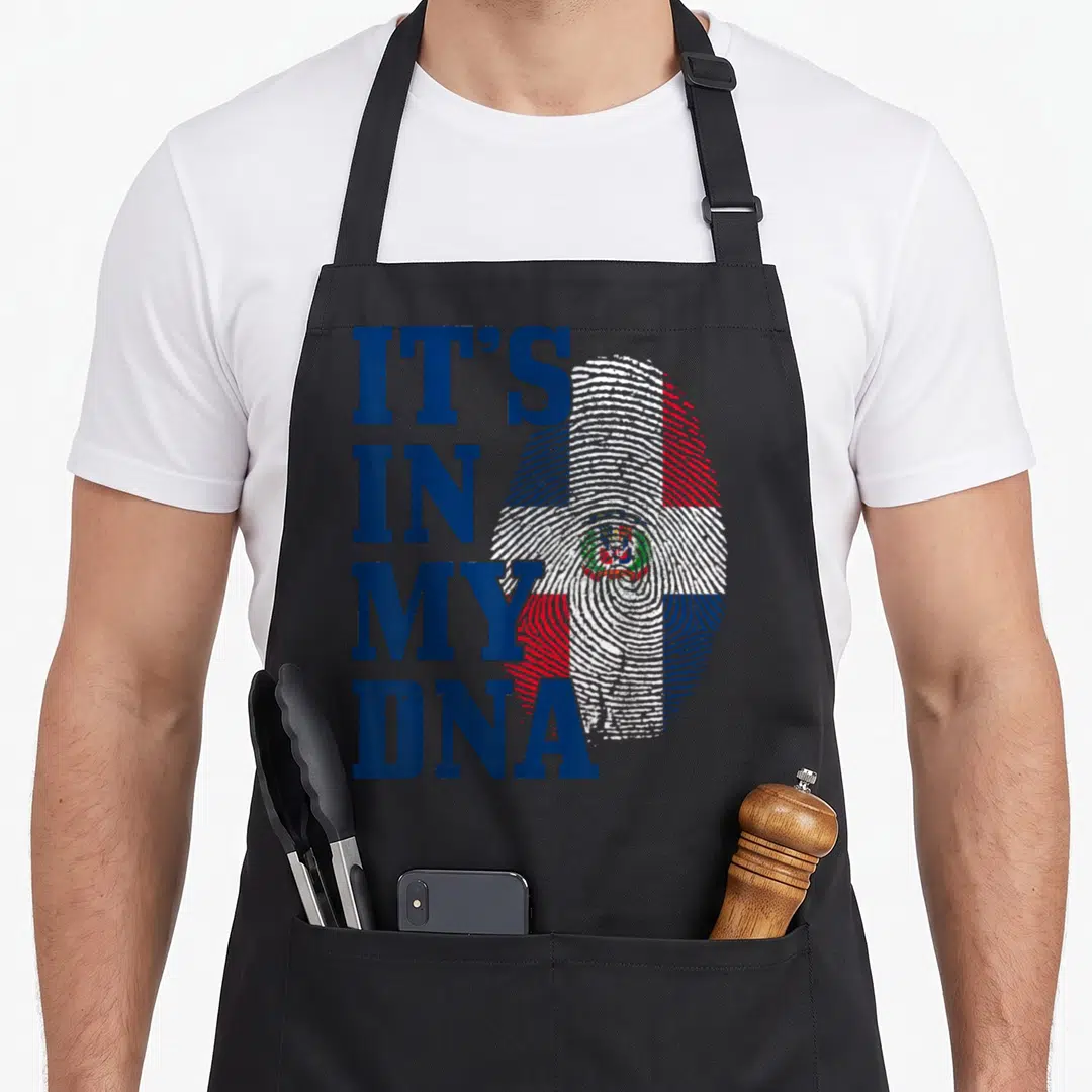 Republic dna pride apron - Distressed blue text IT'S IN MY DNA next to flag colored fingerprint — shown on a black cotton canvas apron against a white background