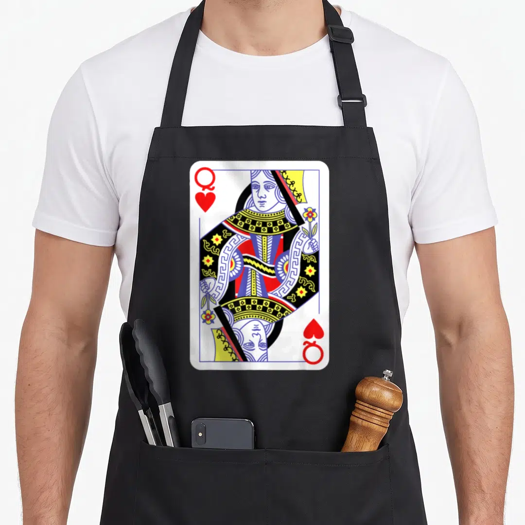 Queen easy apron - Mirrored Queen of Hearts playing card with red Q and hearts in blue, yellow, and black line art — shown on a black cotton canvas apron against a white background