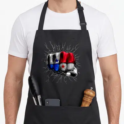 Flag panamanian girl apron - Fist painted in red white and blue breaking through grey surface with white cracks — shown on a black cotton canvas apron against a white background