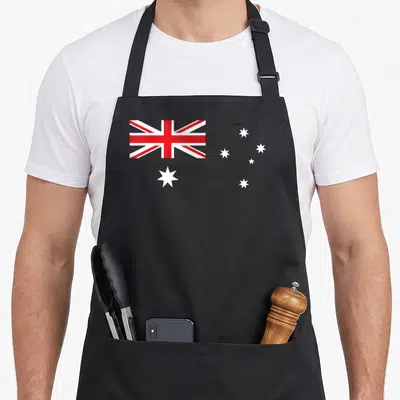 Funny flag australian apron - Minimalist Australian flag print with red white and blue stars — shown on a black cotton canvas apron against a white background