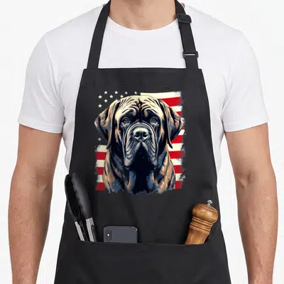 Mastiff 4th of july apron - Realistic brown mastiff head over distressed red white and blue flag — shown on a black cotton canvas apron against a white background