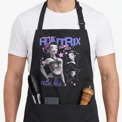 Y2k trend apron - Cartoon woman Zoey with HUNTRIX text and star portraits in purple and black — shown on a black cotton canvas apron against a white background