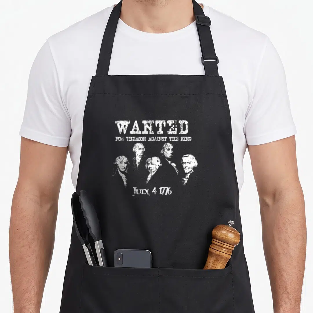 Wanted father day apron - White distressed wanted poster for treason with five founding father portraits and date July — shown on a black cotton canvas apron against a white background