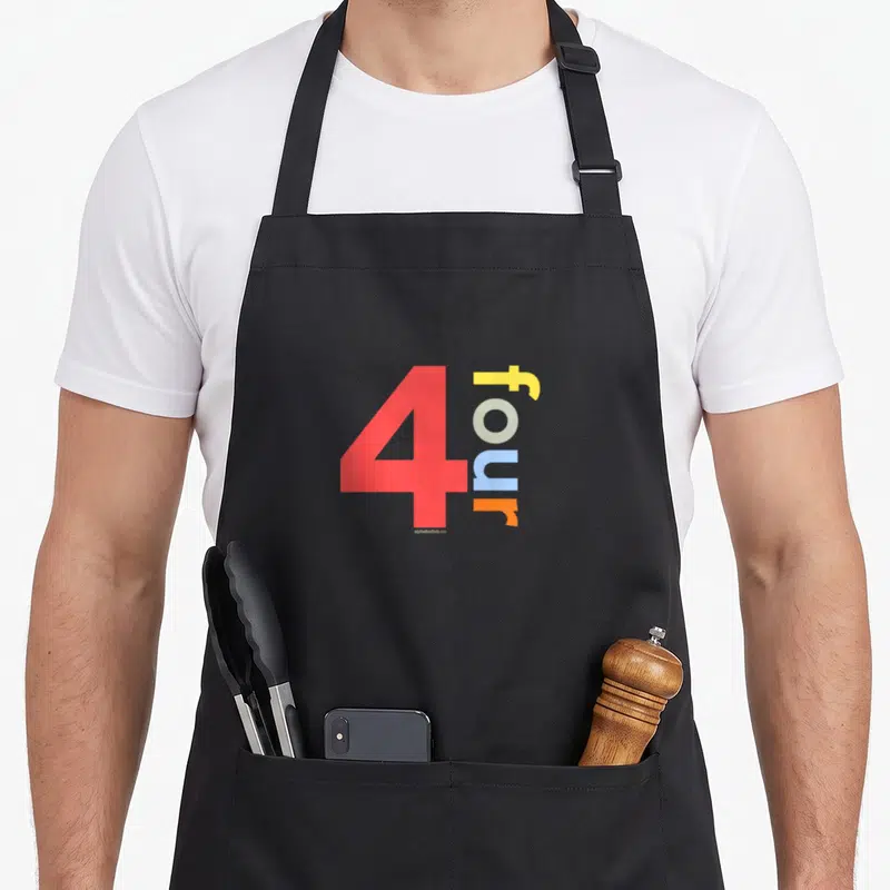 4th age birthday apron - Red numeral 4 with vertical four text in yellow grey blue and orange — shown on a black cotton canvas apron against a white background