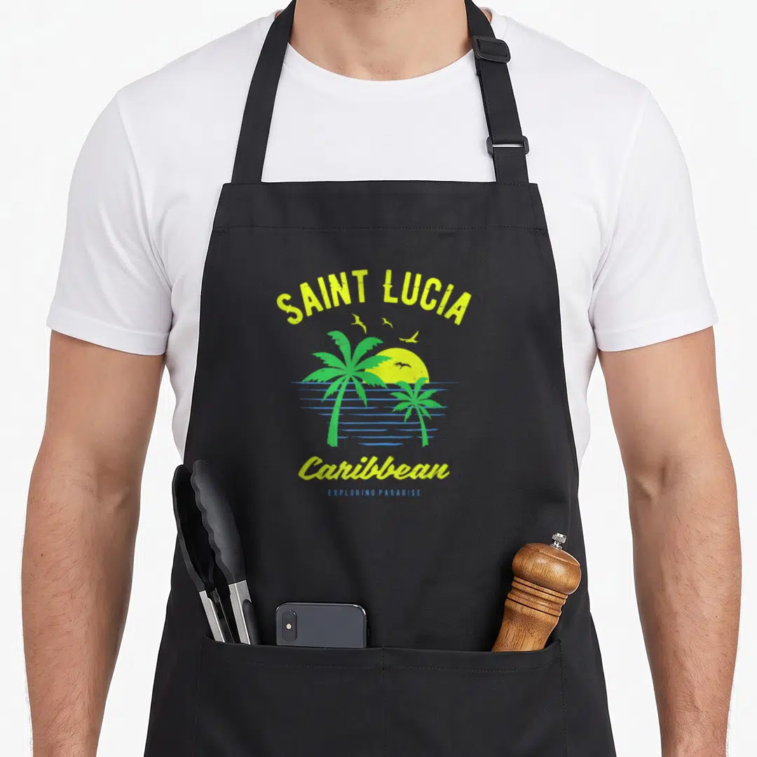 Caribbean saint lucia apron - Retro yellow and green palm tree sunset over blue water lines with Saint Lucia text — shown on a black cotton canvas apron against a white background