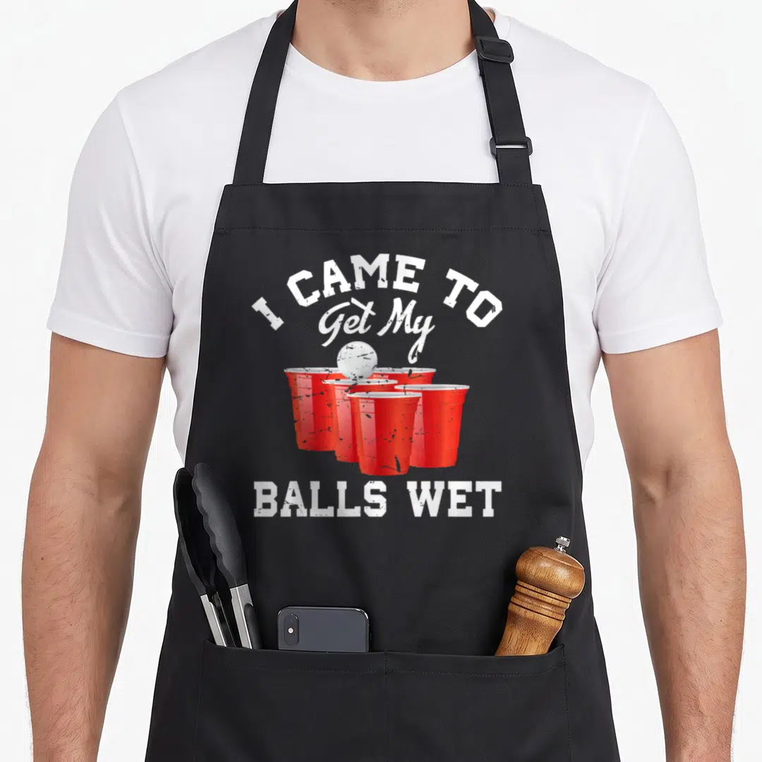 Came ball beer pong apron - Red plastic cups and white ball with text I CAME TO Get My BALLS WET — shown on a black cotton canvas apron against a white background