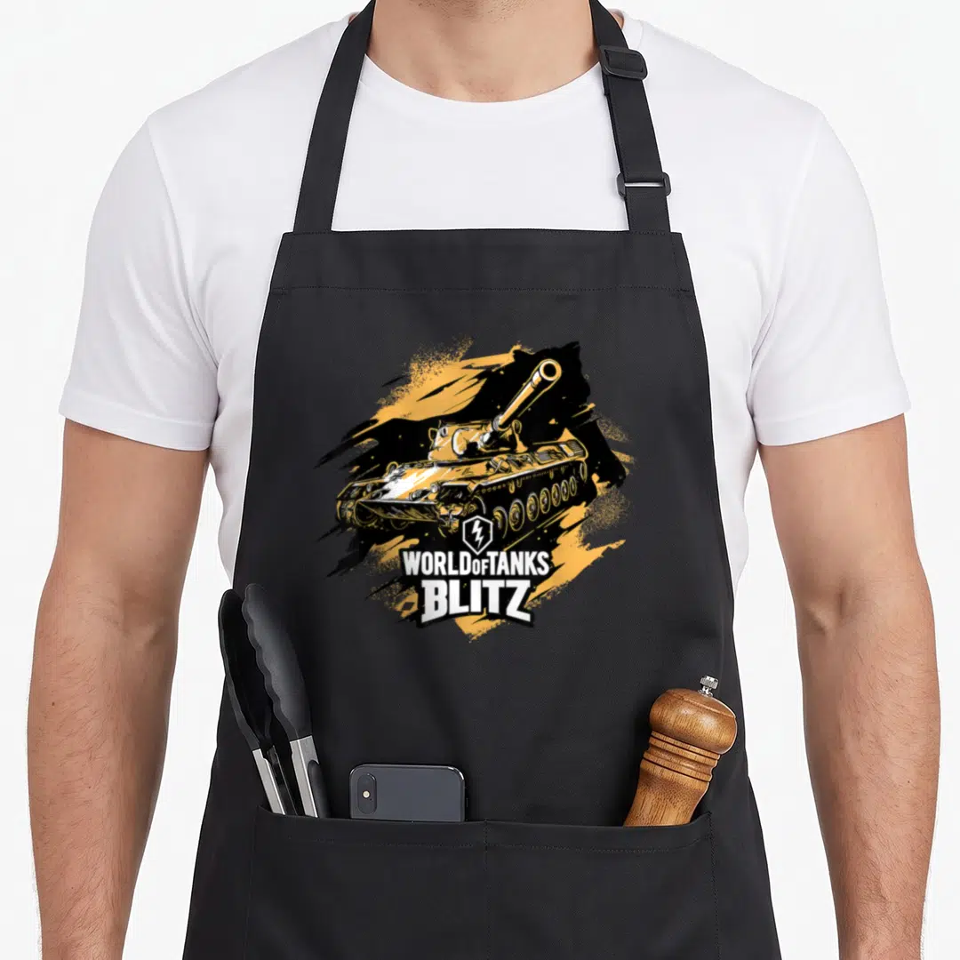 Blitz leo girl apron - Yellow and black tank illustration with WORLD OF TANKS BLITZ text and lightning bolt symbol — shown on a black cotton canvas apron against a white background