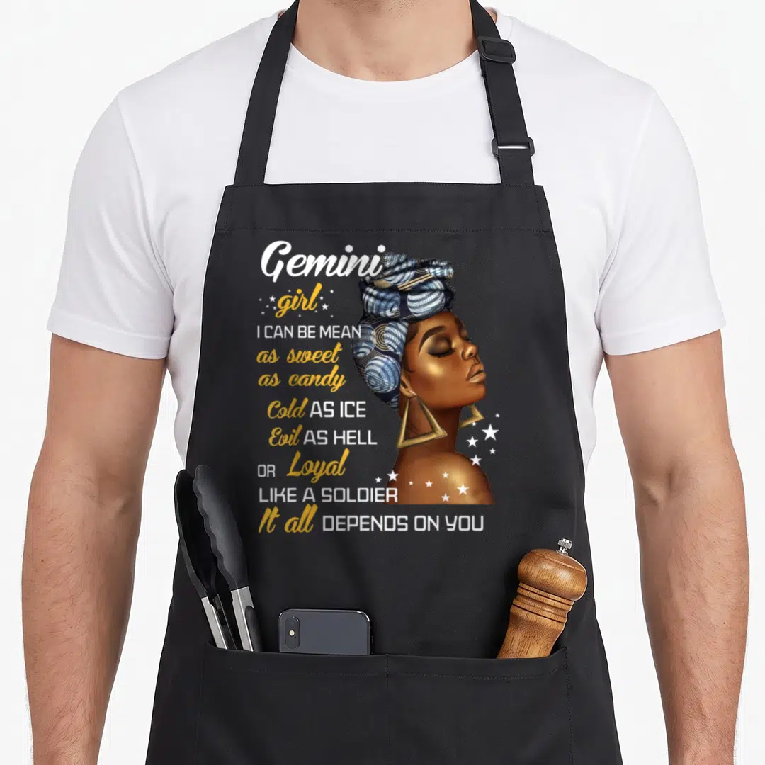 Gemini may birthday apron - Realistic woman profile with Gemini personality text in blue yellow and white — shown on a black cotton canvas apron against a white background