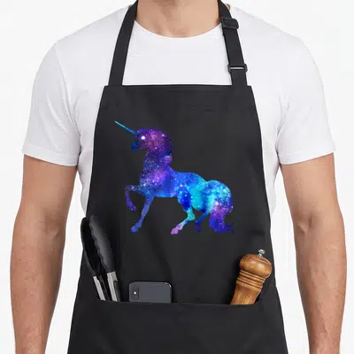 Galaxy unicorn apron - Rearing unicorn silhouette filled with blue purple and white galaxy star pattern — shown on a black cotton canvas apron against a white background