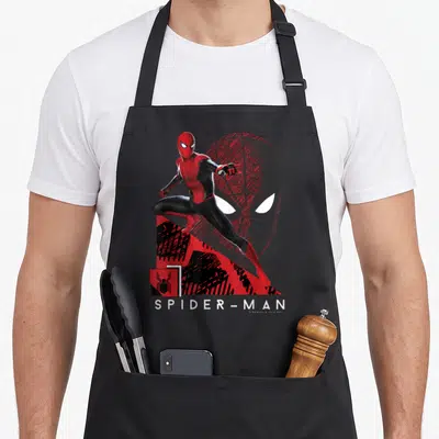 Far novelty apron - Spider-Man action pose with red tech mask background and printed logo text — shown on a black cotton canvas apron against a white background