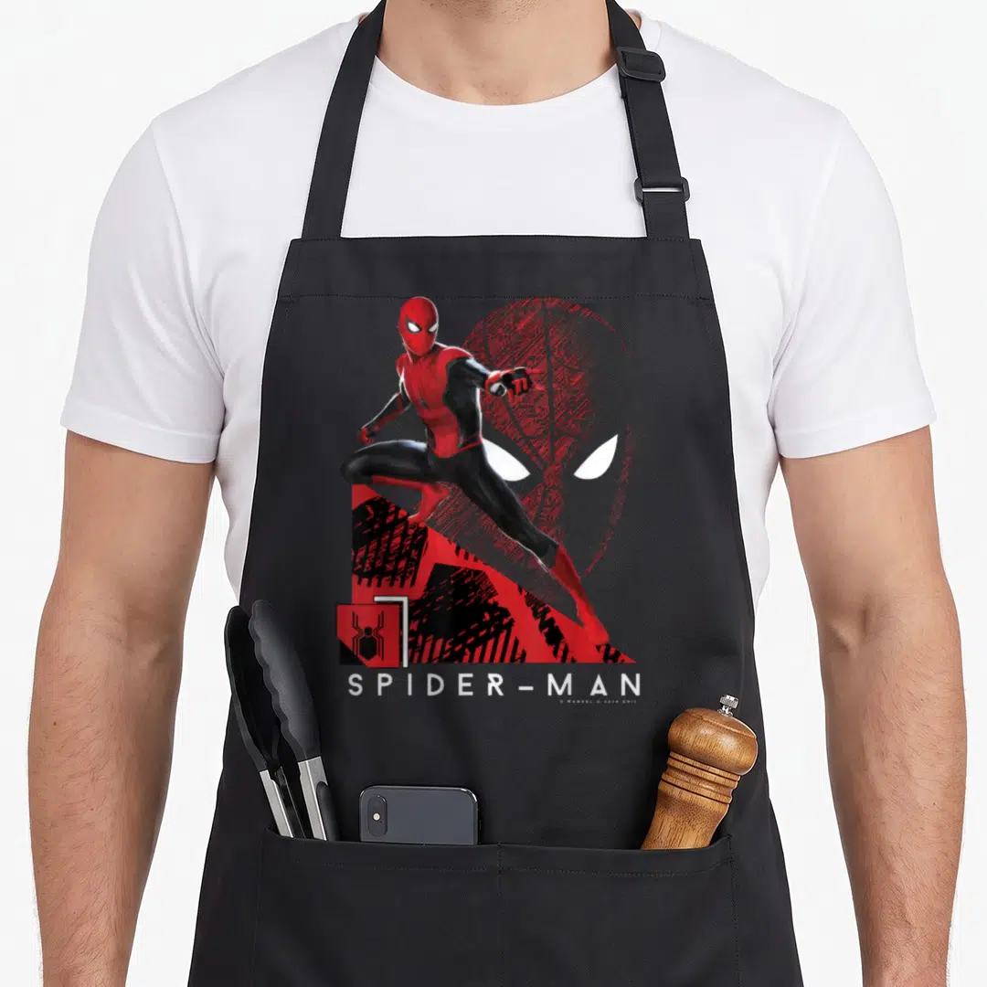 Far novelty apron - Spider-Man action pose with red tech mask background and printed logo text — shown on a black cotton canvas apron against a white background