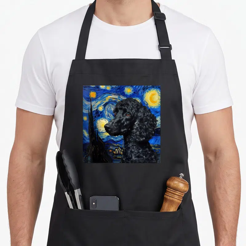 Poodle van gogh apron - Black poodle profile over blue swirling Starry Night background with yellow stars and cypress — shown on a black cotton canvas apron against a white background