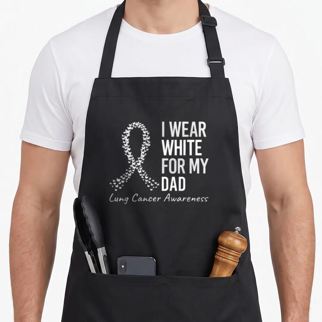 Lung cancer ribbon apron - White awareness ribbon made of small butterflies with stacked text I Wear White For My Dad — shown on a black cotton canvas apron against a white background