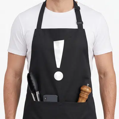 Alphabet markers apron - Single white exclamation mark centered on black bib apron — shown on a black cotton canvas apron against a white background