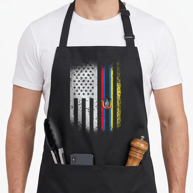 Ecuador american flag apron - Vertical USA and Colombia flags with distressed texture in white red blue and yellow — shown on a black cotton canvas apron against a white background