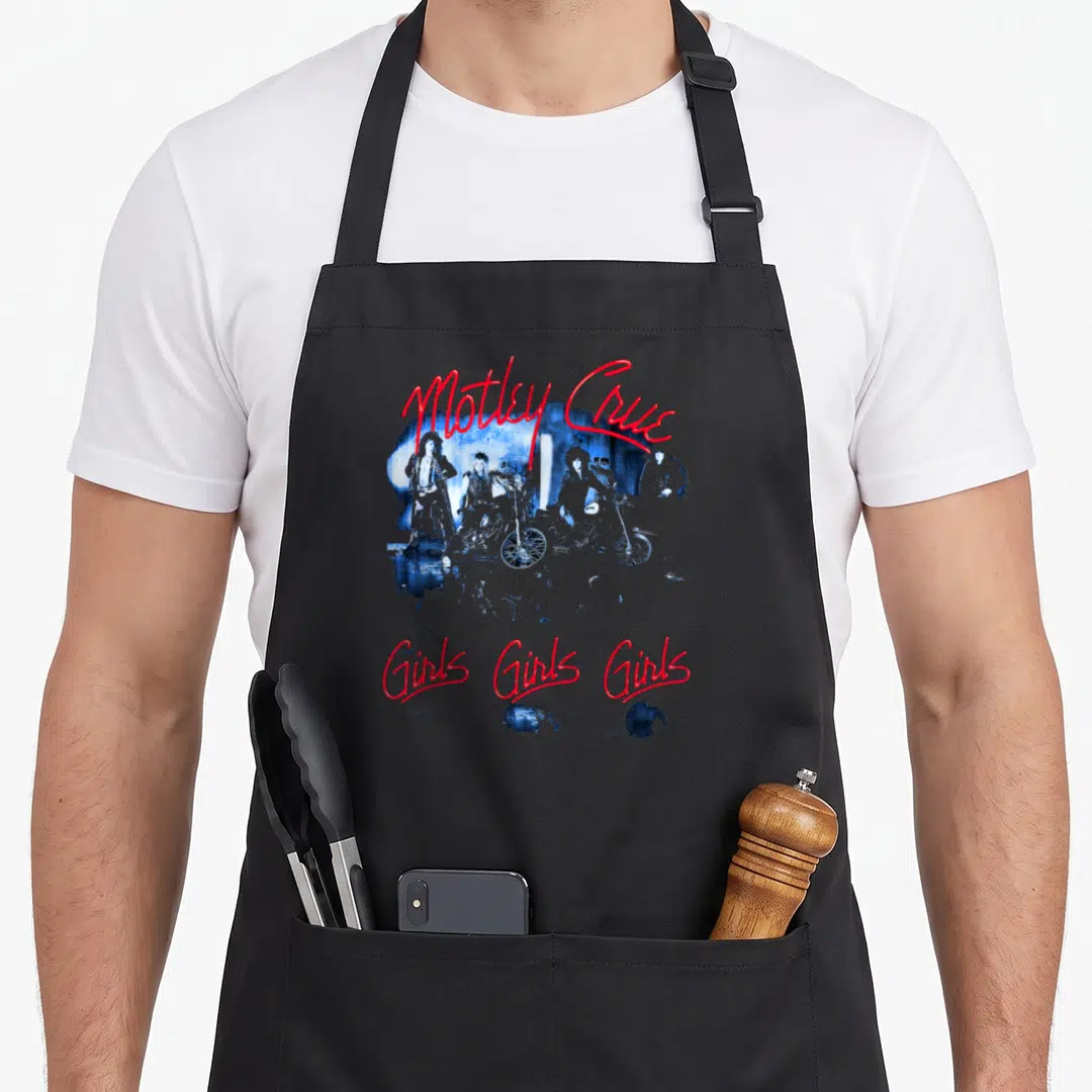 Tracklist e.a apron - Red script Motley Crue and Girls Girls Girls text around blue band photo with motorcycles — shown on a black cotton canvas apron against a white background