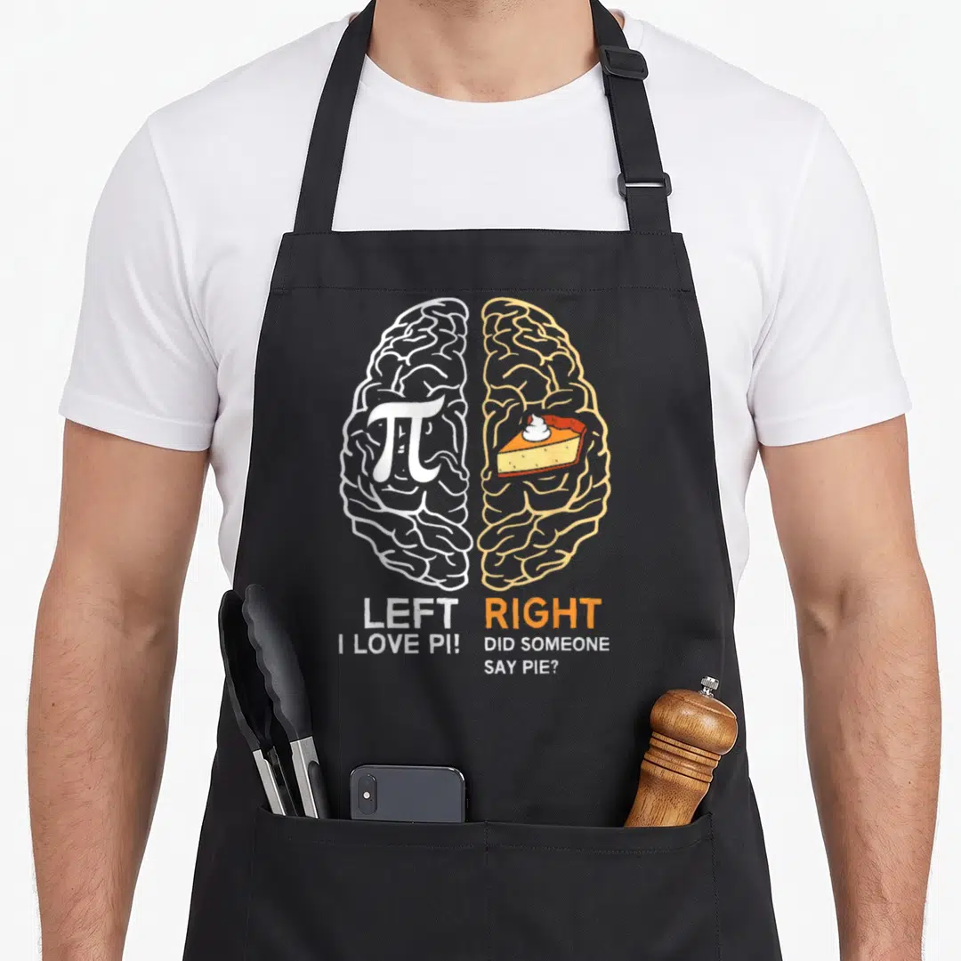 Left pie apron - Split white and orange brain with pi symbol and pie slice below stacked text — shown on a black cotton canvas apron against a white background
