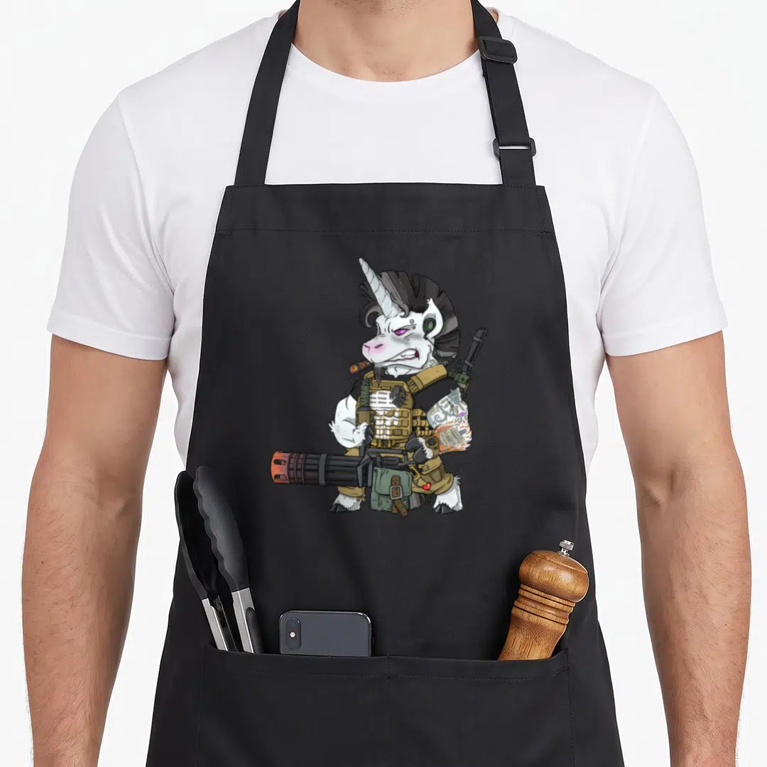 Patriot tactical apron - Cartoon white unicorn in tan vest holding minigun with olive pouch and sword — shown on a black cotton canvas apron against a white background