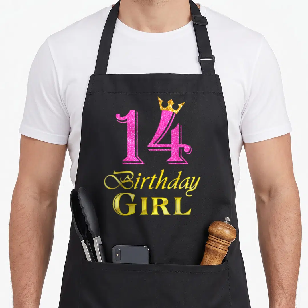 14th princess apron - Pink glitter number 14 with gold crown and Birthday Girl text — shown on a black cotton canvas apron against a white background