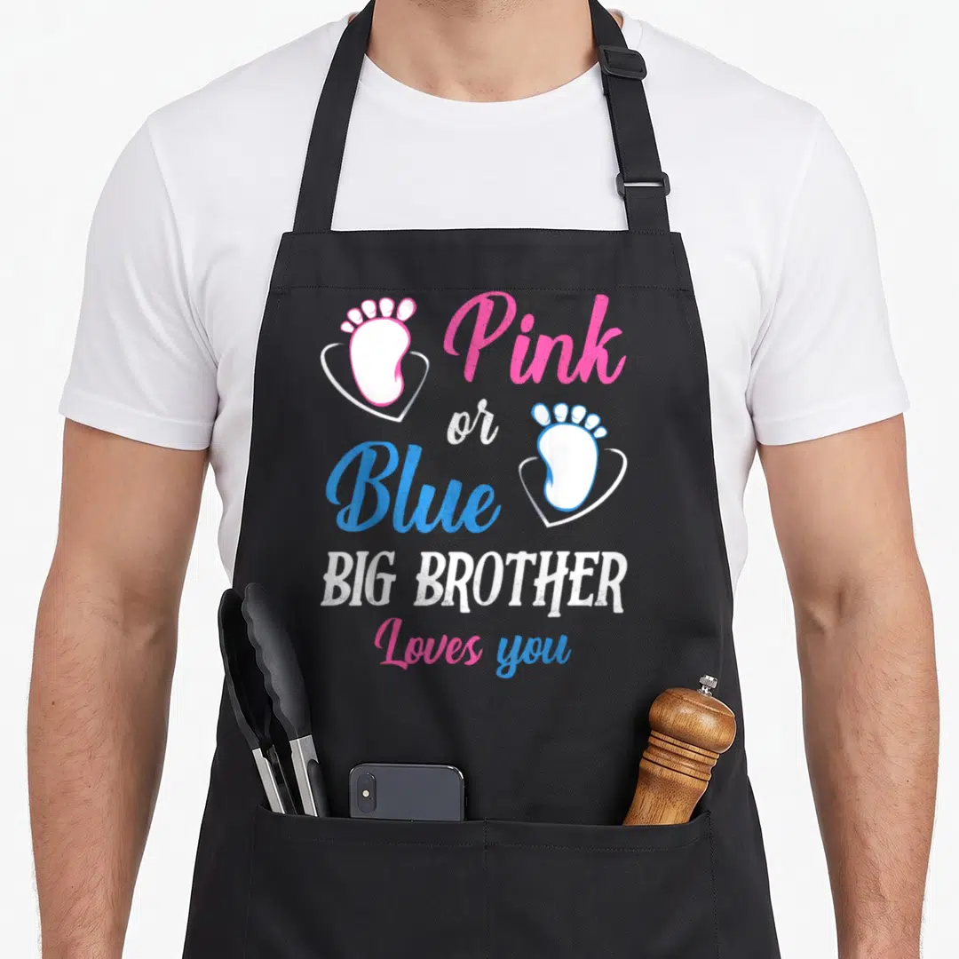 Blue brother apron or apron - Pink and blue baby footprints in hearts with big brother loves you text — shown on a black cotton canvas apron against a white background