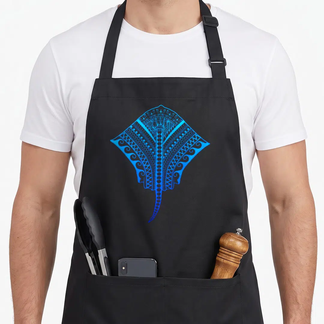 Blue hawaiian apron - Blue Polynesian stingray line art with tribal geometric patterns — shown on a black cotton canvas apron against a white background